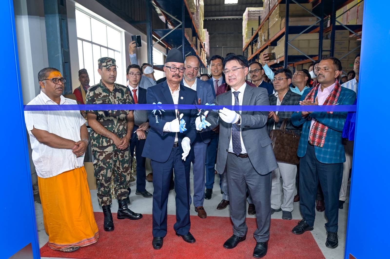 Hon'ble Minister Ramesh Rijal, Ministry of Industry, Commerce, and Supplies & Mr. J.B. Park, President & CEO, Samsung Southwest Asia, jointly inaugurating Samsung TV factory
